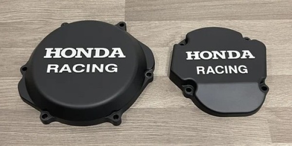 HONDA CR250R 2002-2007 Factory Billet Clutch Cover Ignition Stator Cover Finished in Black Cerakote.