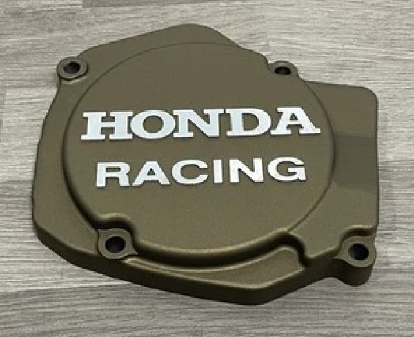 HONDA CR125R 1990-2006 Factory Billet Ignition Cover Finished In Burnt Bronze Cerakote.